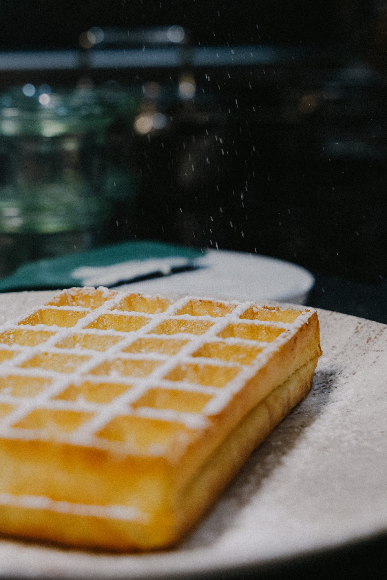 Brussels waffle dusted with icing sugar.